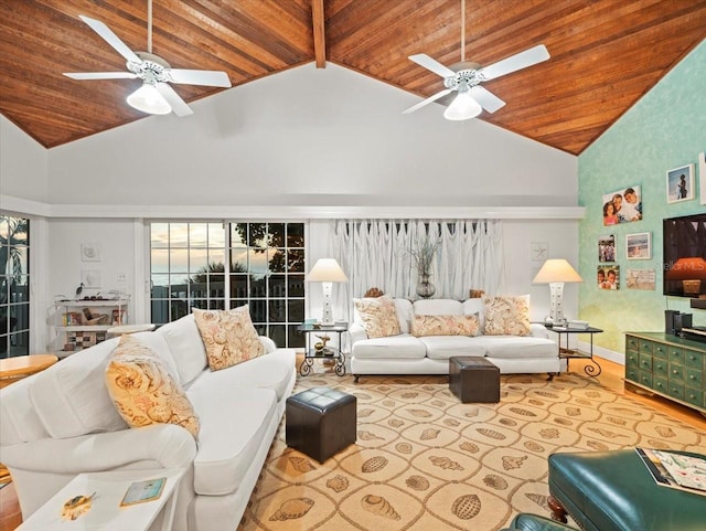 living room with wood ceiling, high vaulted ceiling, and ceiling fan