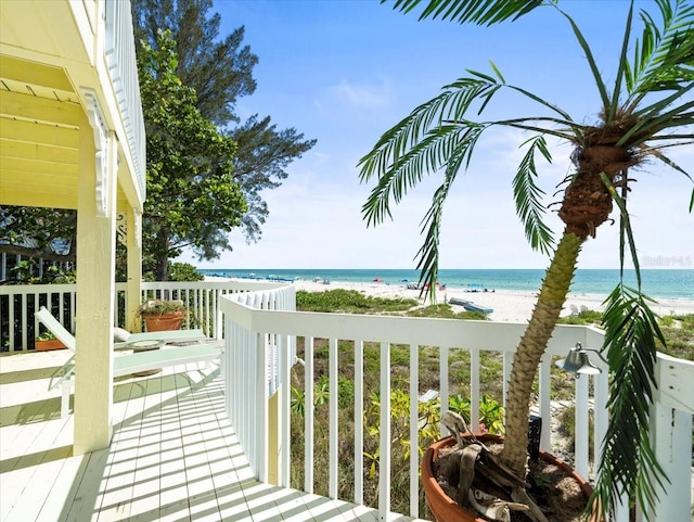 wooden deck with a water view