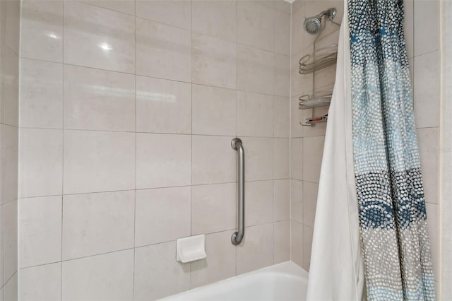 bathroom featuring shower / tub combo with curtain