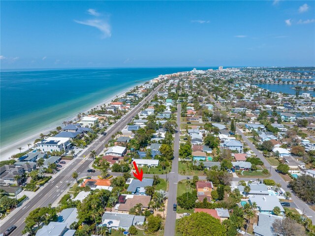 drone / aerial view featuring a view of the beach and a water view