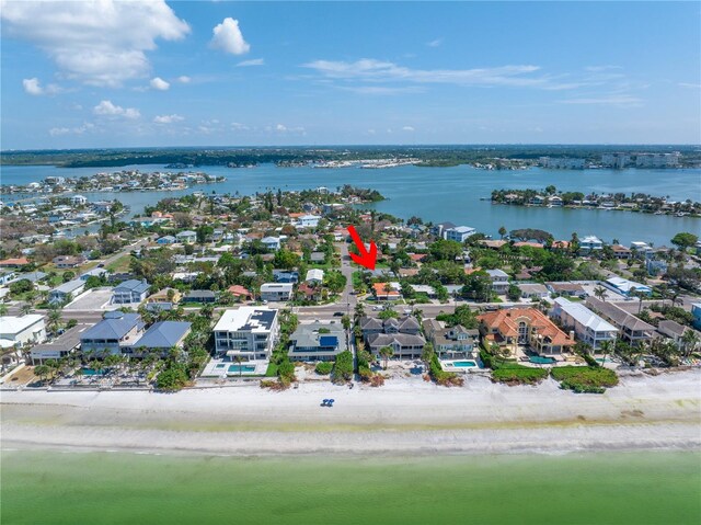 bird's eye view featuring a water view and a view of the beach