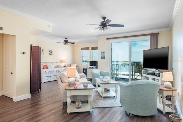 living room featuring a textured ceiling, dark hardwood / wood-style floors, and ornamental molding