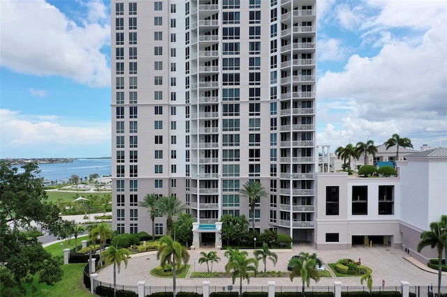 view of building exterior featuring a water view