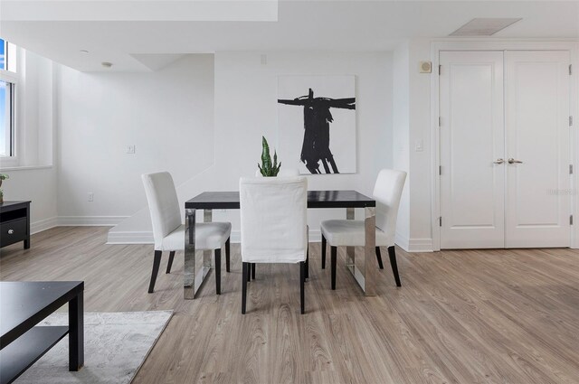 dining area featuring light hardwood / wood-style floors