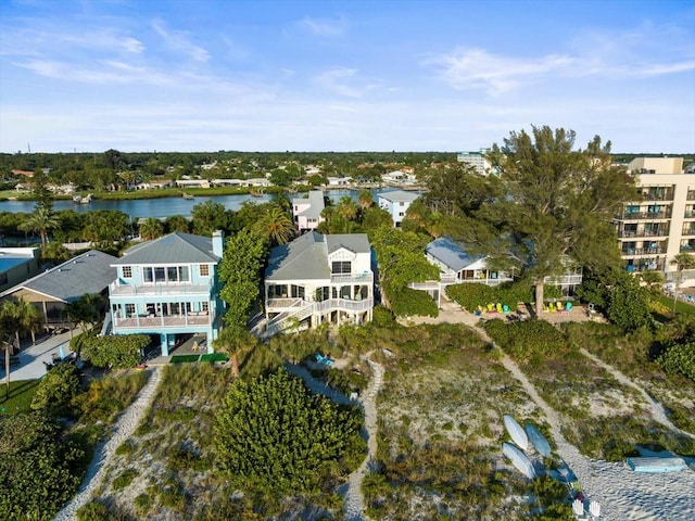 drone / aerial view with a water view