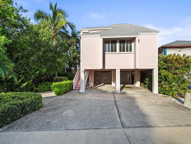 view of front of home featuring a carport