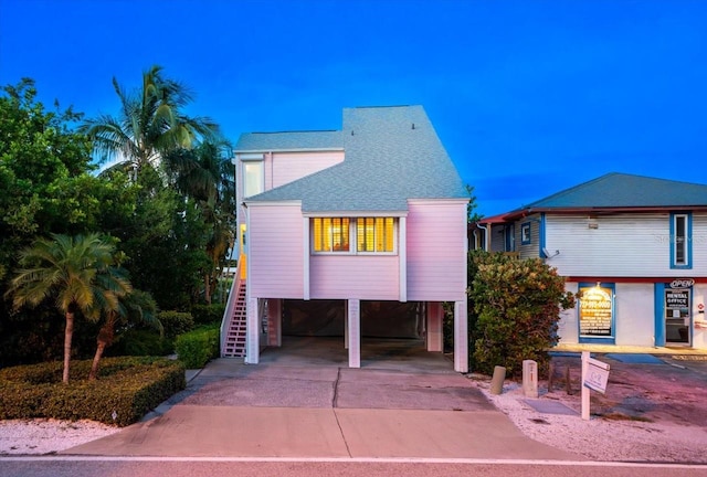 view of front of property with a carport