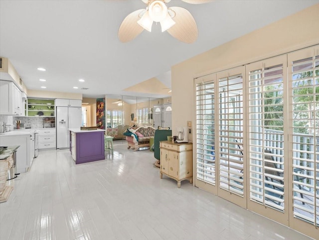 living room featuring ceiling fan