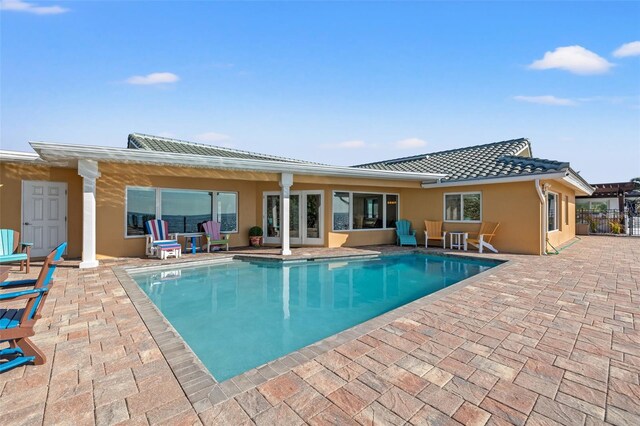 back of house with a patio area