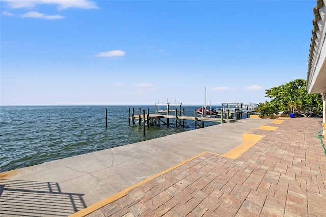 view of dock with a water view