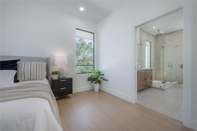 bedroom featuring light hardwood / wood-style floors