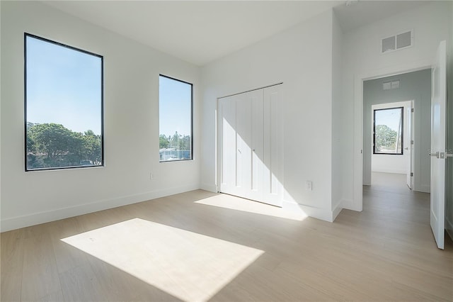 empty room with light wood-type flooring