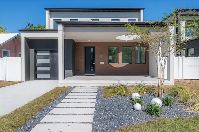 contemporary home featuring a porch