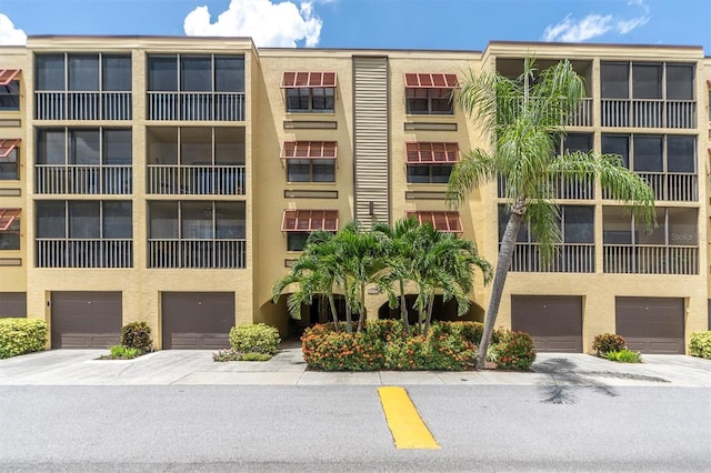 view of building exterior featuring a garage