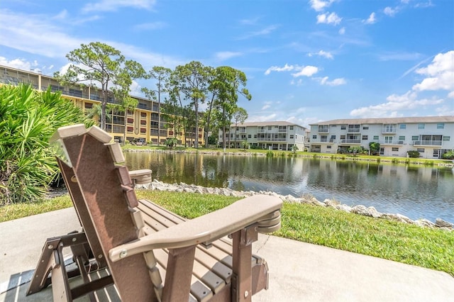 view of home's community with a water view