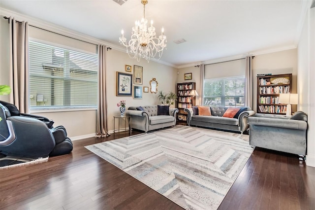 living room featuring crown molding, dark hardwood / wood-style flooring, and a notable chandelier