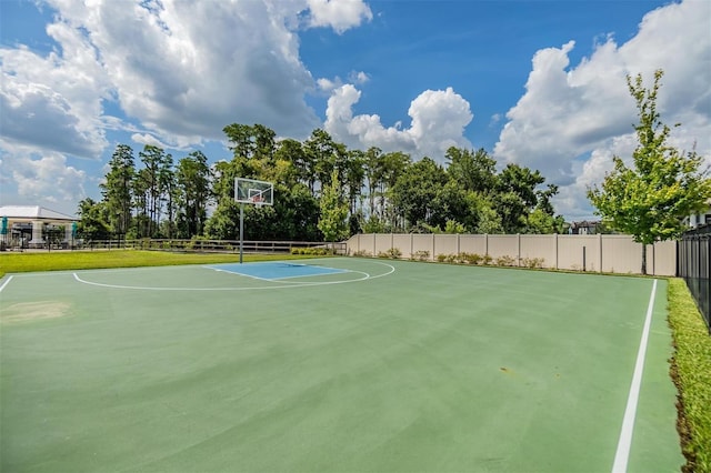 view of sport court with community basketball court and fence