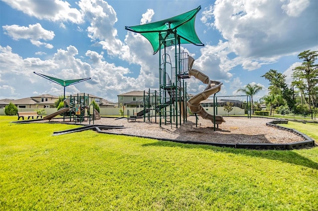 community play area with a lawn