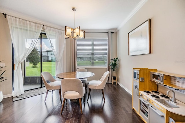 dining area with a chandelier, baseboards, dark wood-style floors, and crown molding