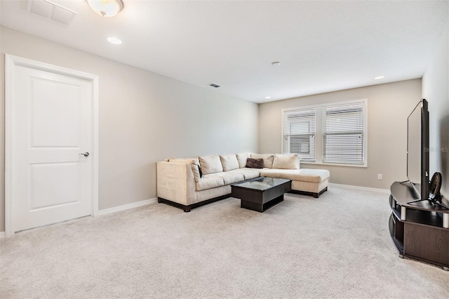 carpeted living room featuring recessed lighting, visible vents, and baseboards