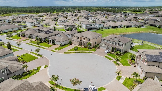 aerial view with a residential view and a water view