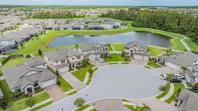 aerial view with a residential view and a water view