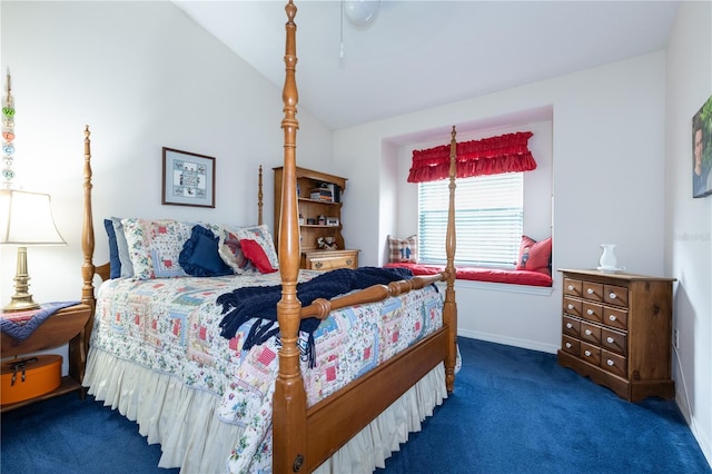 carpeted bedroom featuring lofted ceiling