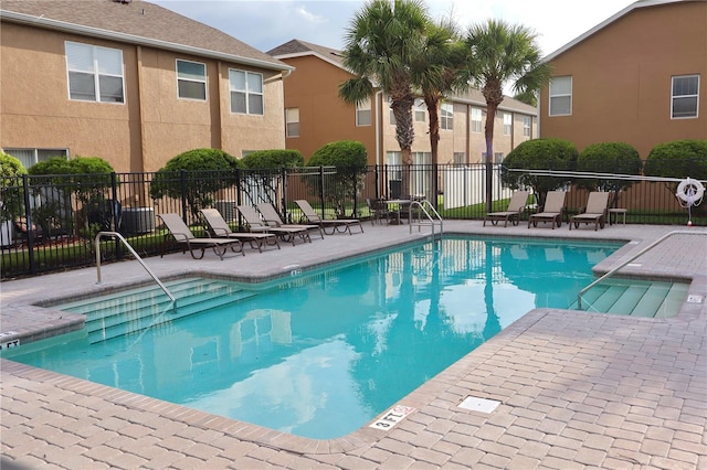 view of swimming pool featuring a patio