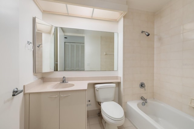 full bath with shower / bathing tub combination, vanity, toilet, and tile patterned floors