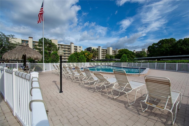 view of swimming pool featuring a patio area