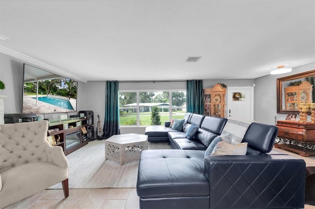 living room with light tile patterned floors