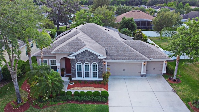 view of front of property featuring a garage