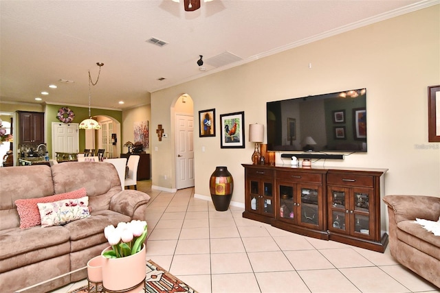 tiled living room with ornamental molding