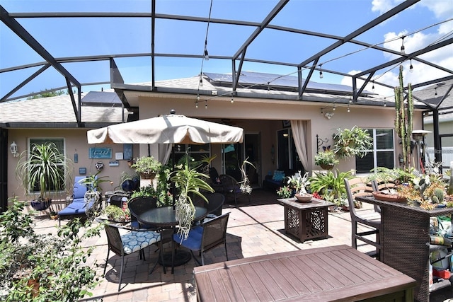 view of patio with a lanai