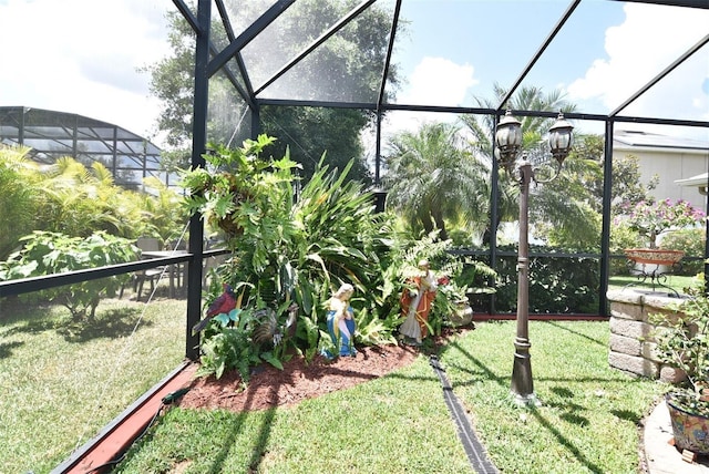 view of yard featuring a lanai