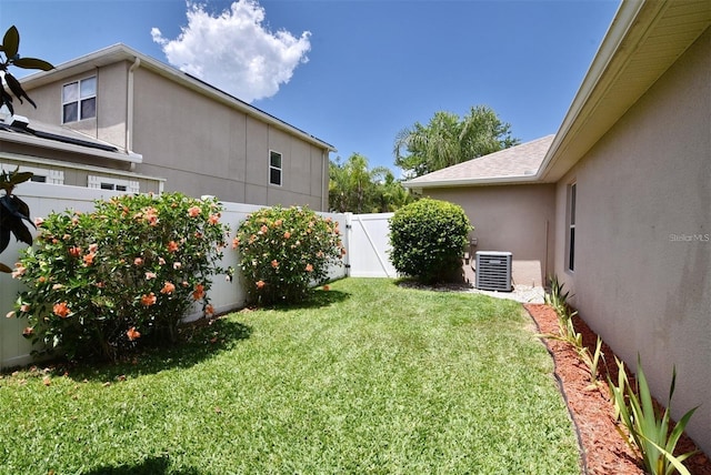 view of yard featuring central AC