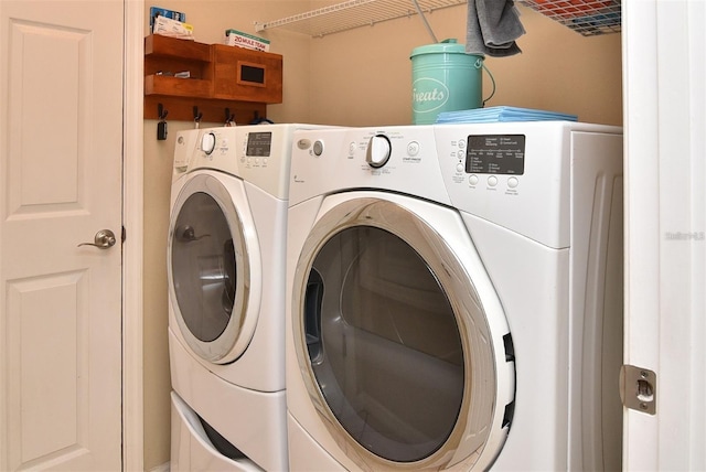 washroom with separate washer and dryer