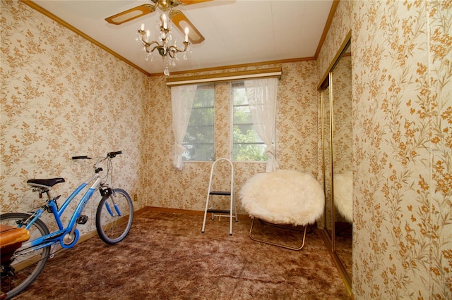 interior space featuring a ceiling fan, carpet flooring, crown molding, and wallpapered walls