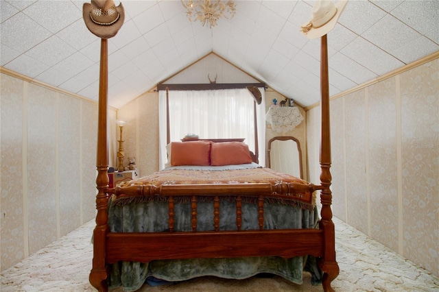 carpeted bedroom featuring lofted ceiling