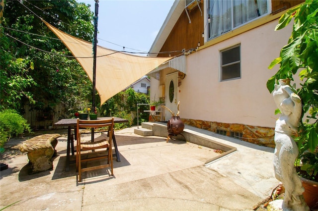 view of patio with outdoor dining area