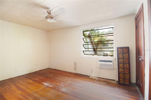 unfurnished room with ceiling fan and wood-type flooring