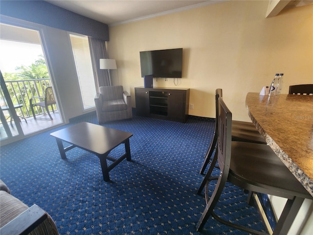 carpeted living room featuring crown molding