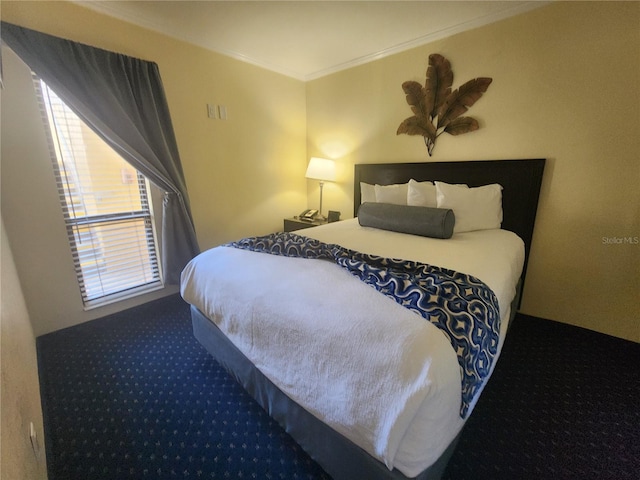 bedroom with ornamental molding