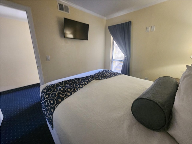 bedroom with carpet and crown molding