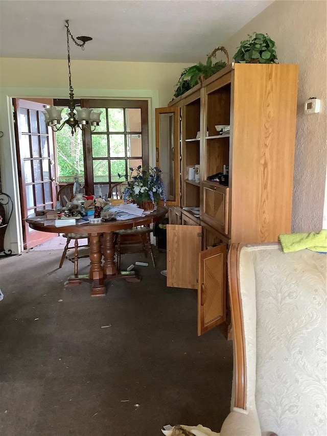 dining area featuring a chandelier