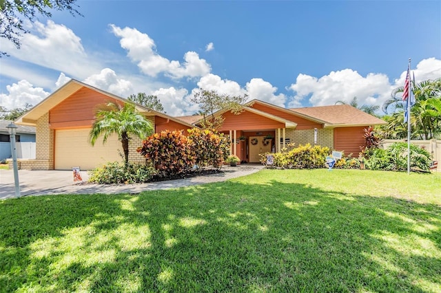 single story home with a garage and a front lawn