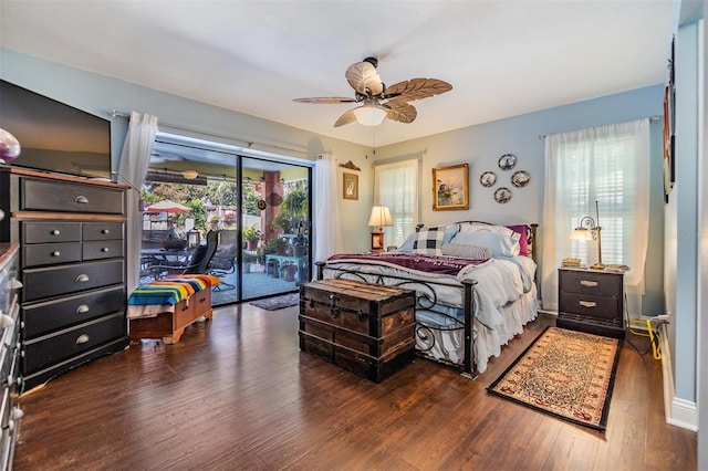 bedroom with dark hardwood / wood-style flooring, access to outside, and ceiling fan