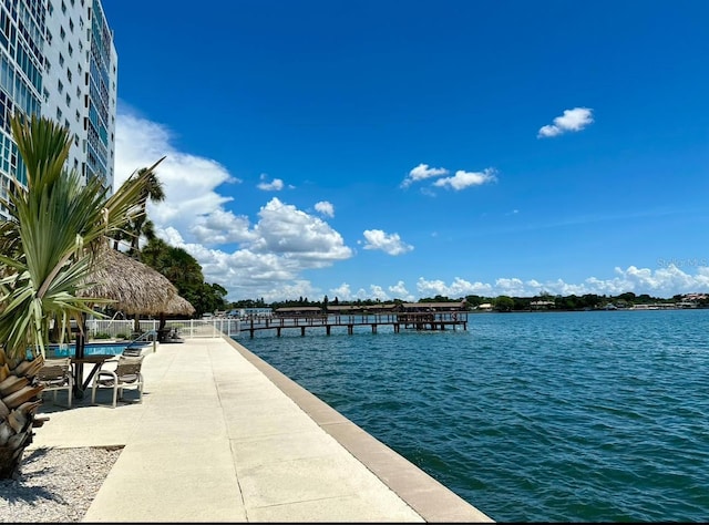 view of dock with a water view and a gazebo