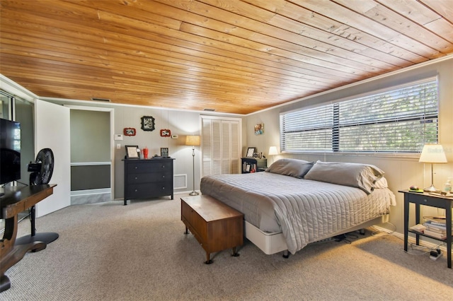 bedroom featuring light colored carpet, wood ceiling, and ornamental molding