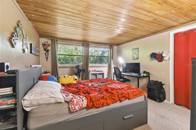 carpeted bedroom with wooden ceiling